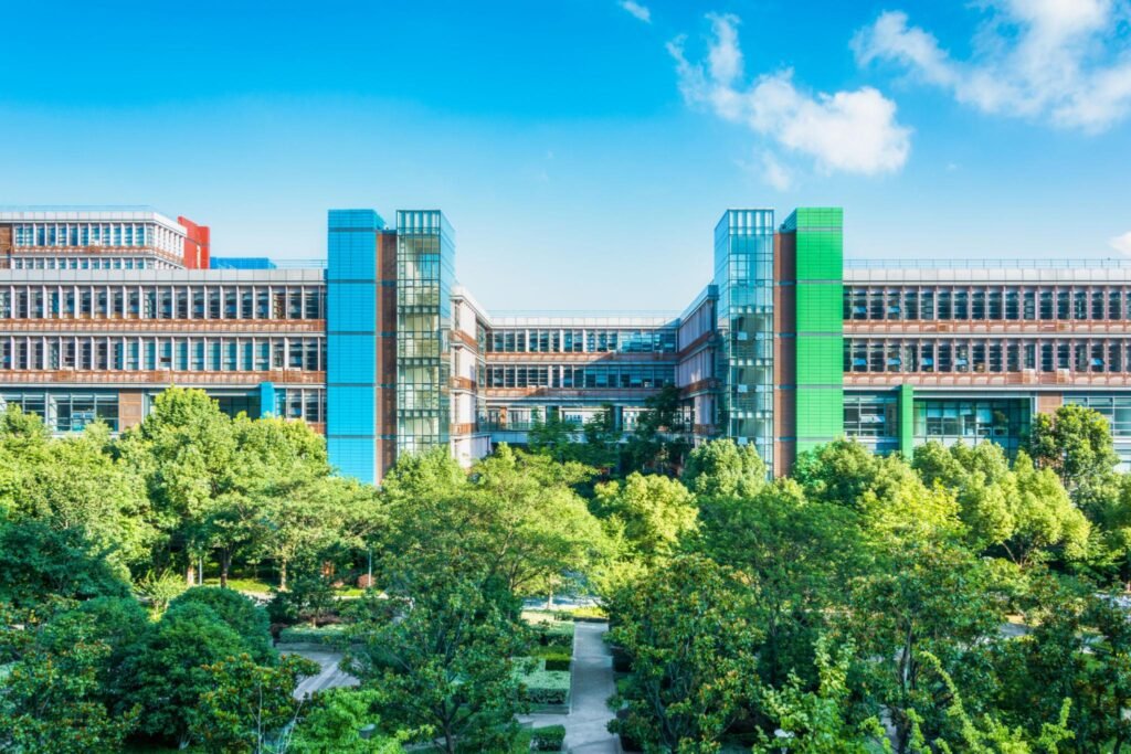 International students walking in a modern Chinese university campus with advanced academic facilities